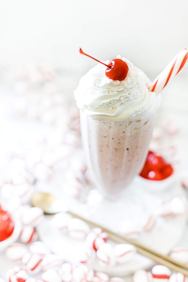 A close up of the top of Chick Fil A peppermint shake.