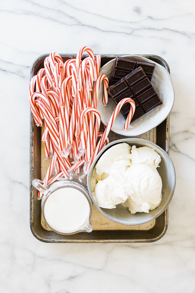 Ingredients needed to make a peppermint shake on a baking tray.
