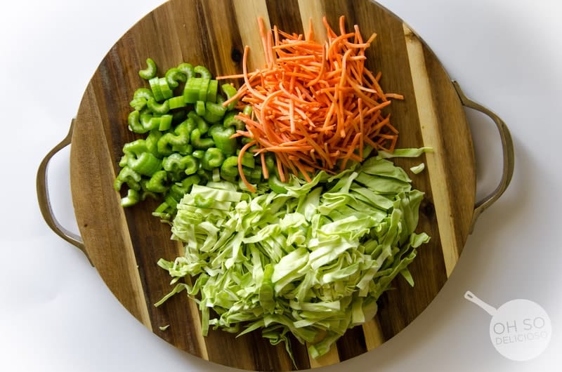 Pansit chopped vegetables on circular cutting board