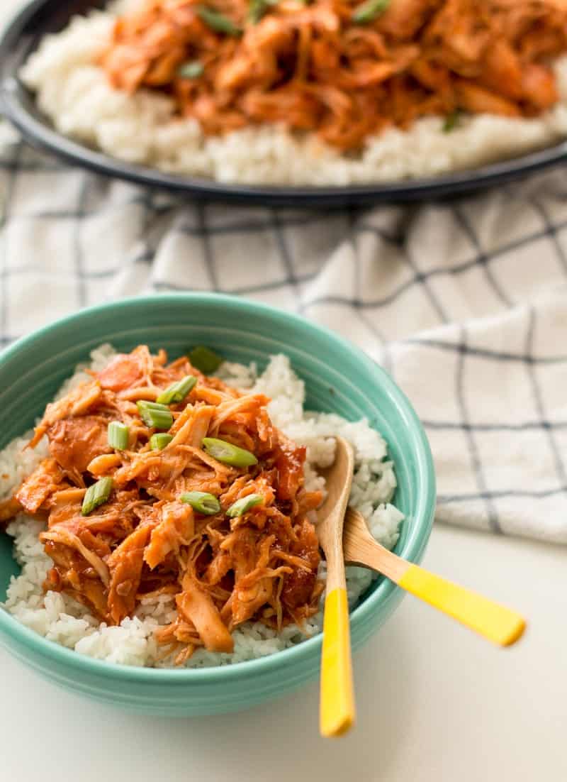Apricot Chicken Crockpot Recipe in bowl with serving spoons