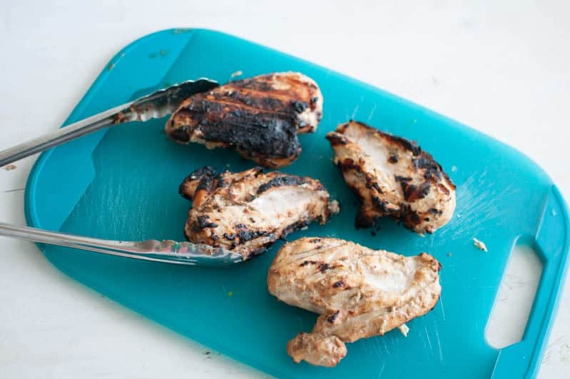 Grilled chicken on cutting board