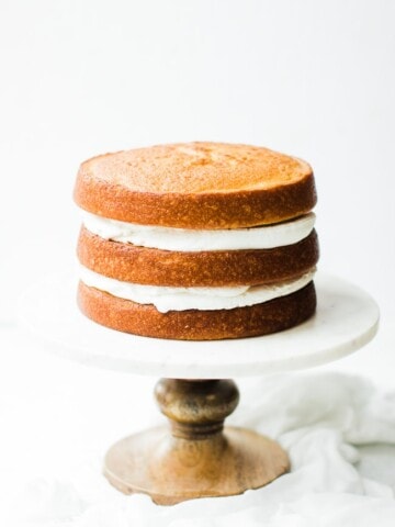 three layer cake, stacked with frosting in-between.