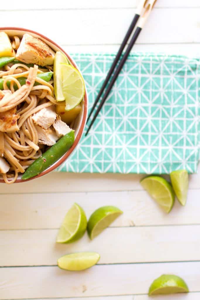Pasta with Peanut Sauce with chop sticks and lime wedges
