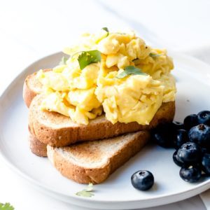The Best Scrambled Eggs Recipe featured by popular food blogger, Oh So Delicioso