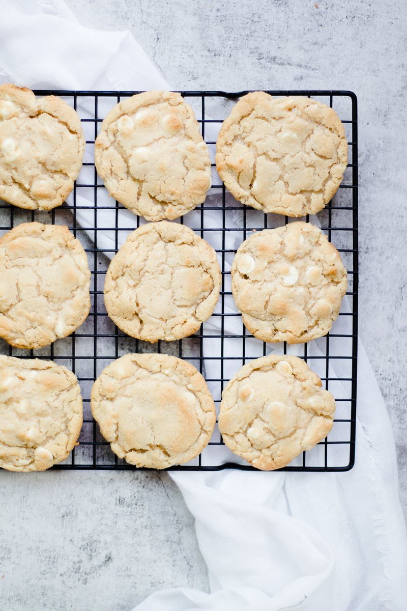 White chocolate chip cookies on a cooling rack