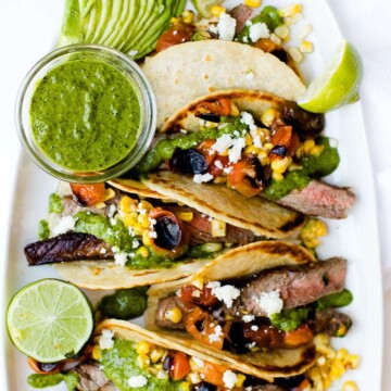 Chimichurri Steak Tacos Recipe featured by popular Los Angeles food blogger, Oh So Delicioso