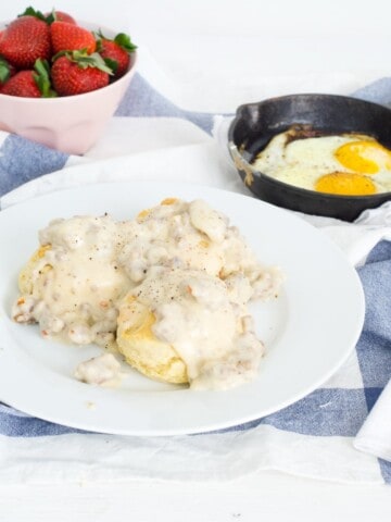 A side shot of buttermilk biscuits and gravy