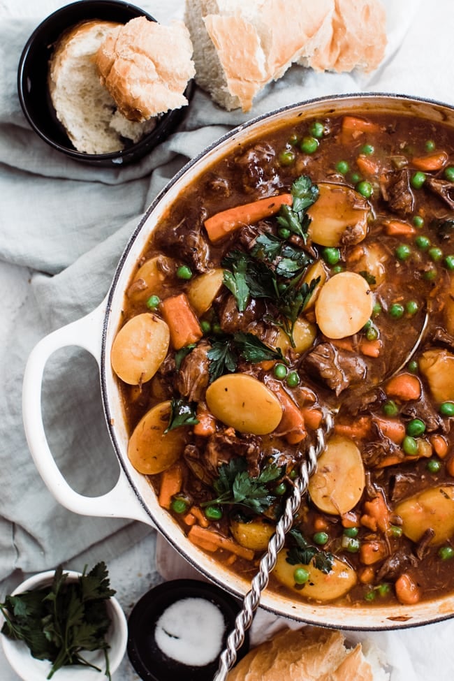 Tender, slow-roasted beef, carrots, celery and tender potatoes come together for the ultimate beef stew. For a quicker method I’m showing how to make pressure cooker beef stew with all the same intense flavor as if it roasted for hours on the stove. || Oh So Delicioso #beefstew #souprecipes #easydinners #instantpotrecipes