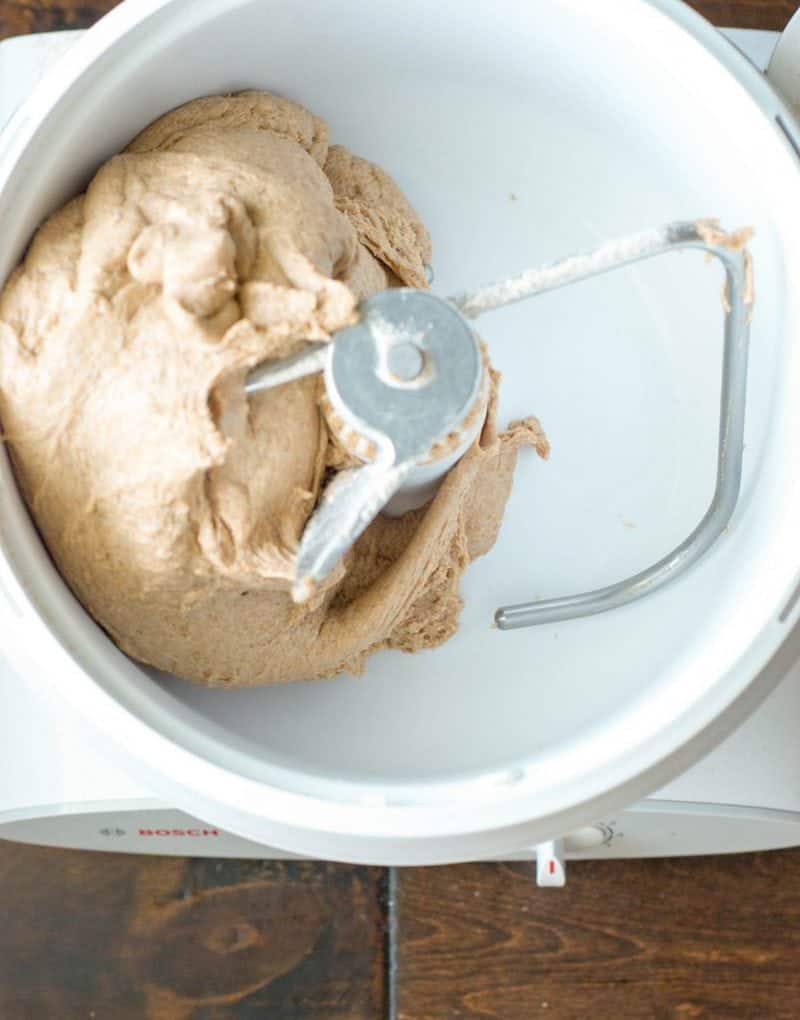 100% Whole Wheat Bread dough in a mixer attached to a dough hook