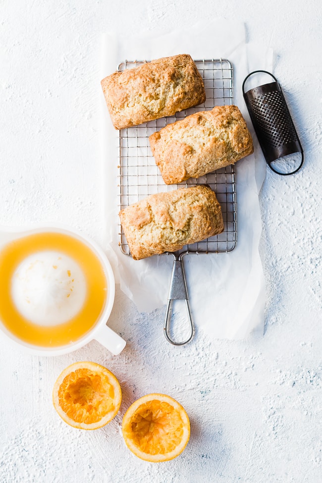 Orange Mini Loaves on a wire cooling rack. 