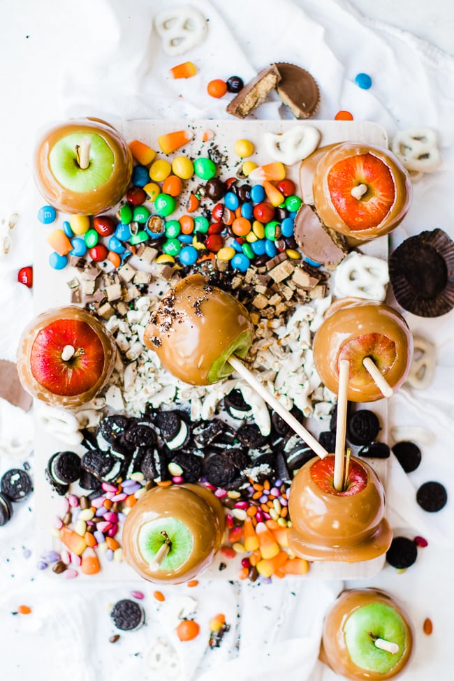 8 caramel apples on candy