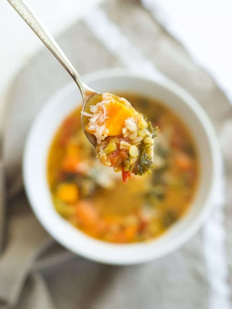 a spoonful of Lentil and Farro Vegetable Soup