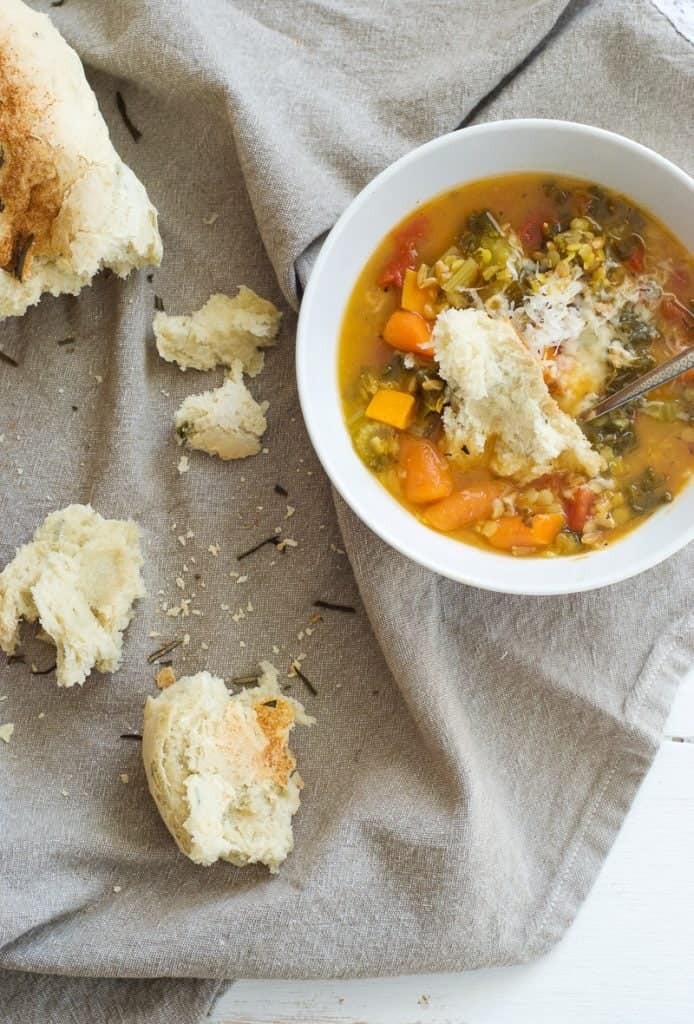 Lentil and Farro Vegetable Soup with bread on the side