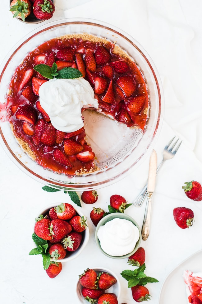 strawberry pie with whip cream on top