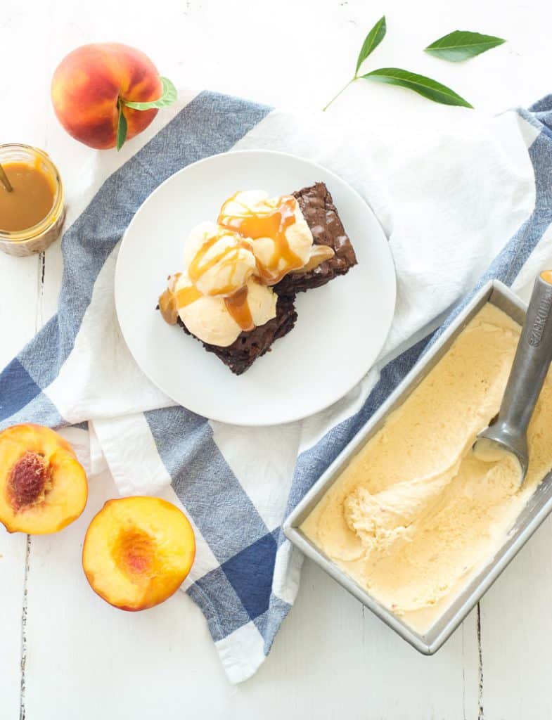 Peaches and Cream Frozen Custard on top of brownies