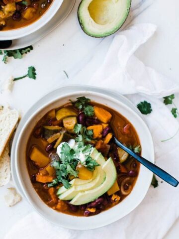bowl bowl of vegetarian chili with avocado