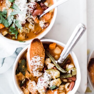 minestrone vegetable soup with a cheesy toasted bread