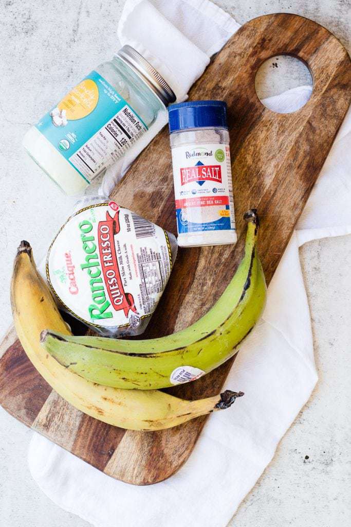Ingredients for making Healthy Fried Plantains on a wooden board