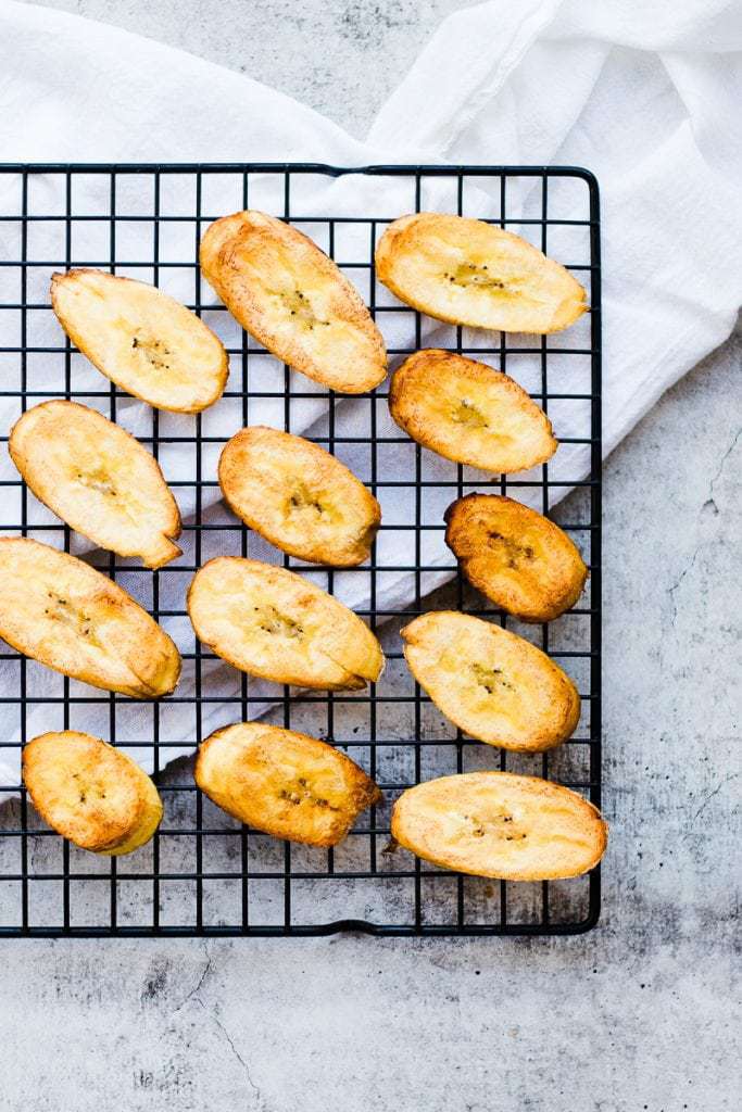 Healthy Fried Plantains on a cooling rack