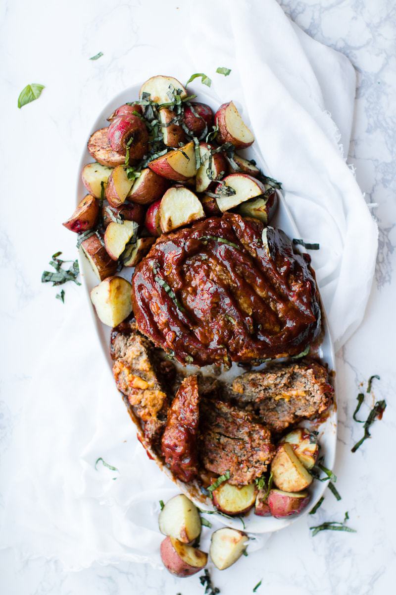 Instant pot cheeseburger meatloaf on a white platter