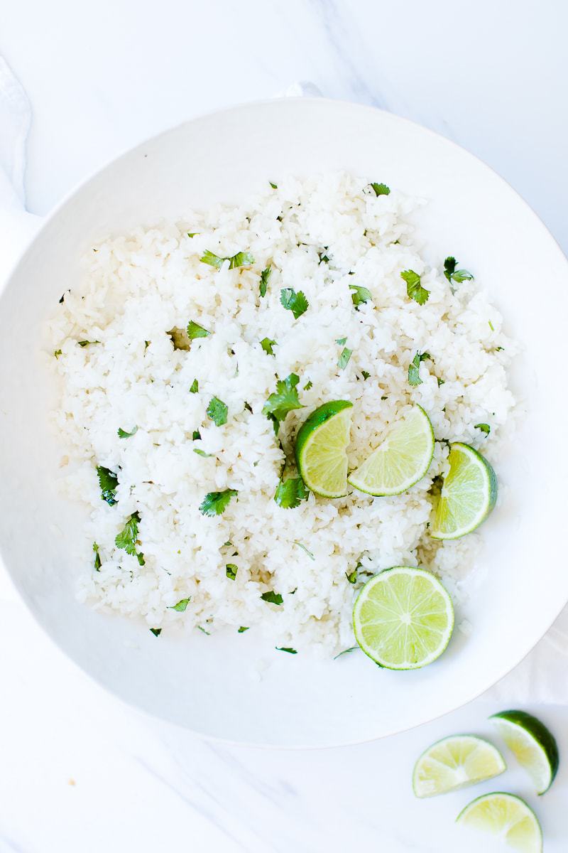A close up of Cilantro Lime Rice in a white bowl