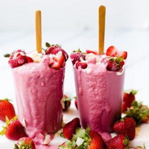 coconut strawberry smoothie in two glasses