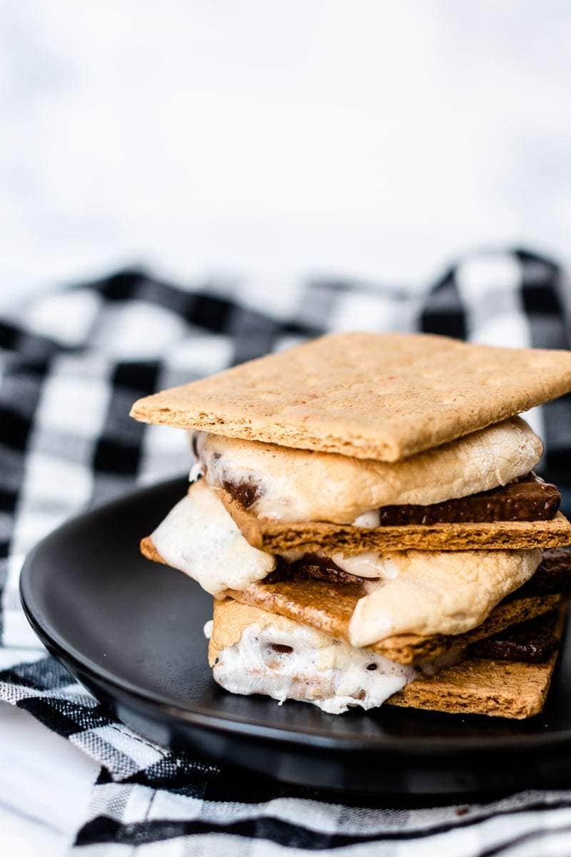 classic s'mores on a black plate