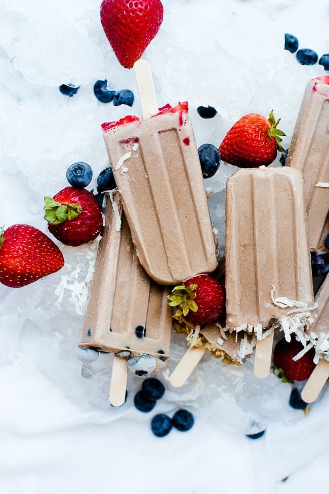protein popsicle with strawberries and blueberries