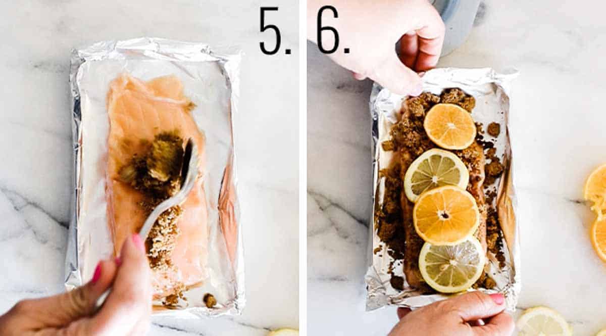 Spreading the orange glaze for salmon over a piece of fish and topping with citrus slices.