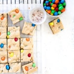 Chewy blondies recipe cut into squares, on a cooling rack.