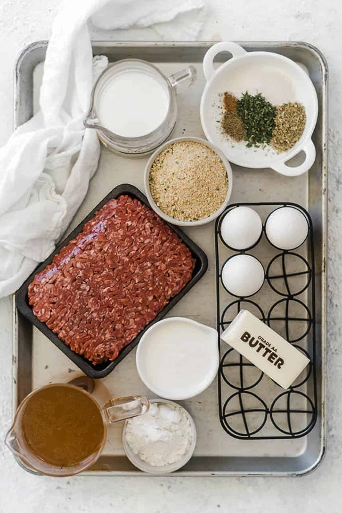 Ingredients for swedish meatballs on a tray before preparing.