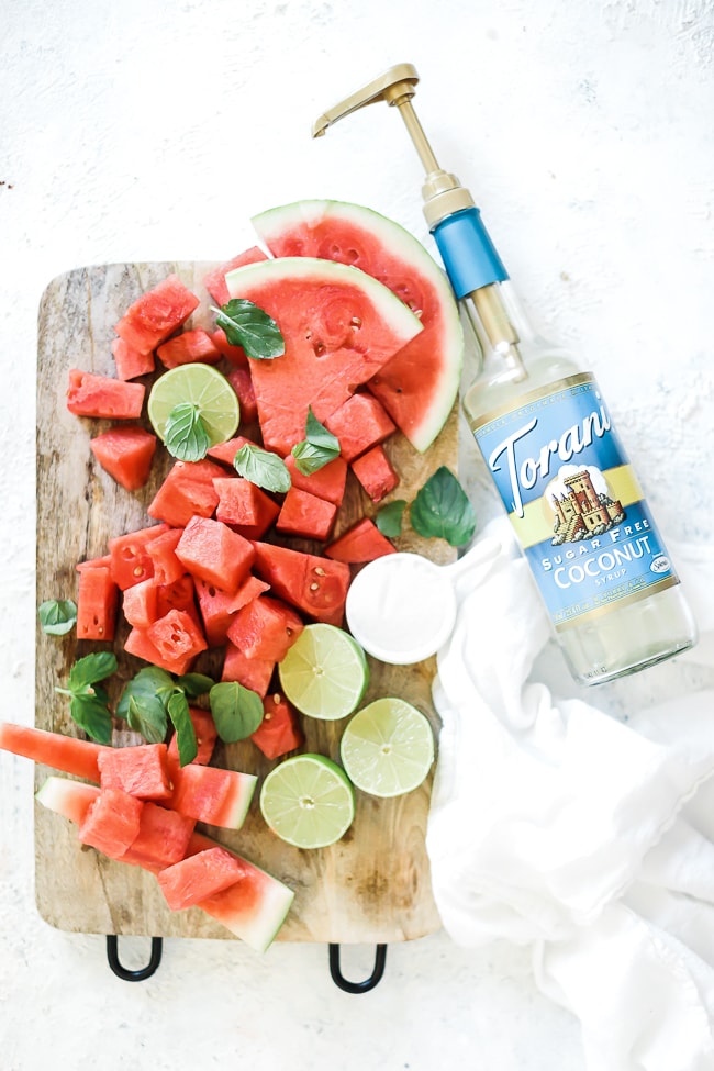 Ingredients needed for watermelon slush- watermelon, lime, coconut syrup.