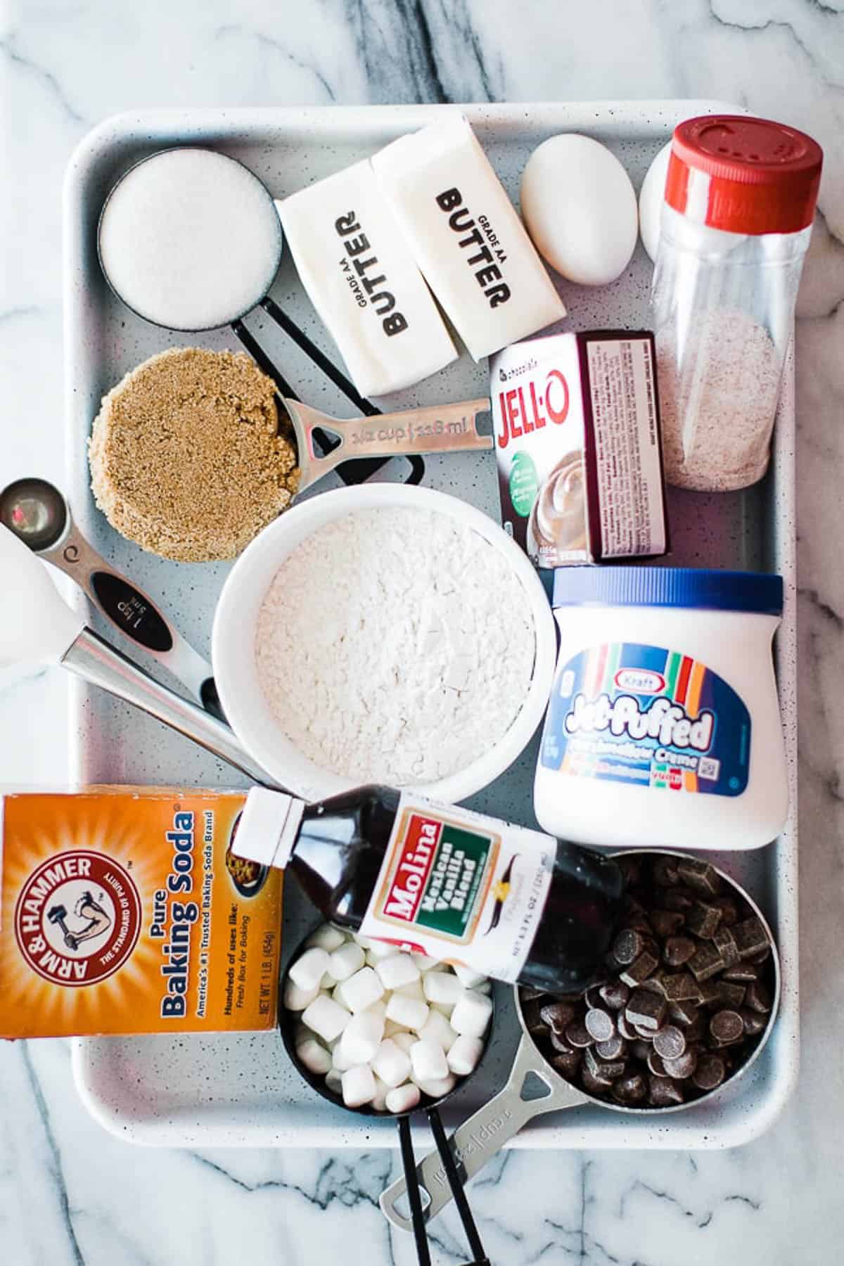 ingredients for marshmallow cookies on a tray
