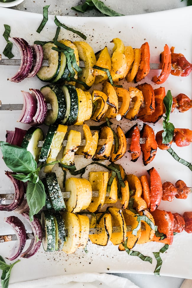 A close up of grilled vegetable skewers.