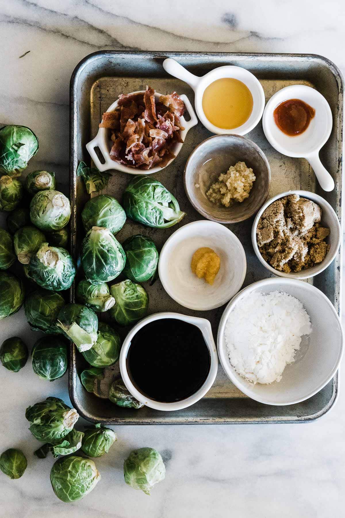 Ingredients needed to make roasted Brussels sprouts.
