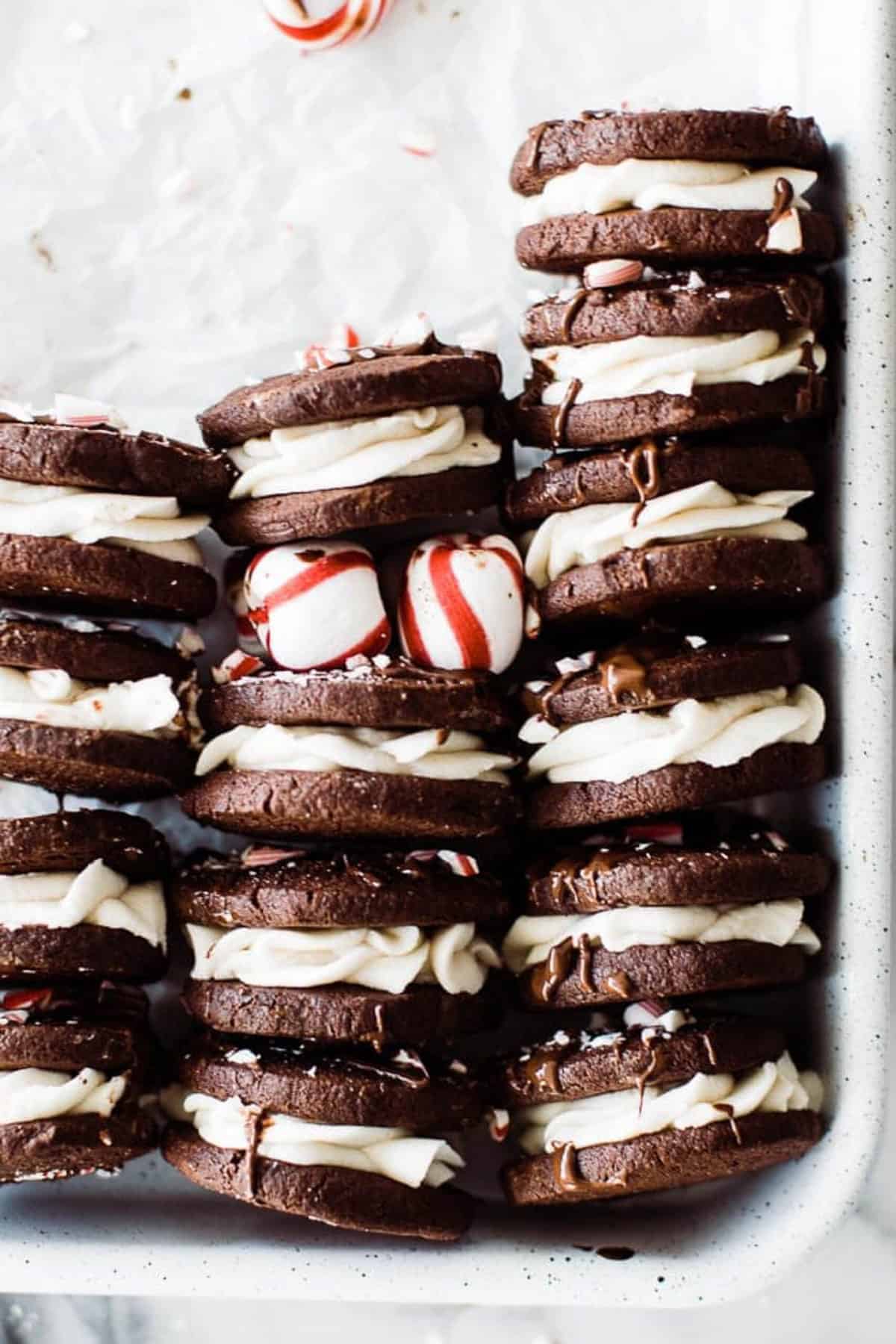 cookies stacked on top of each other in sheet pan