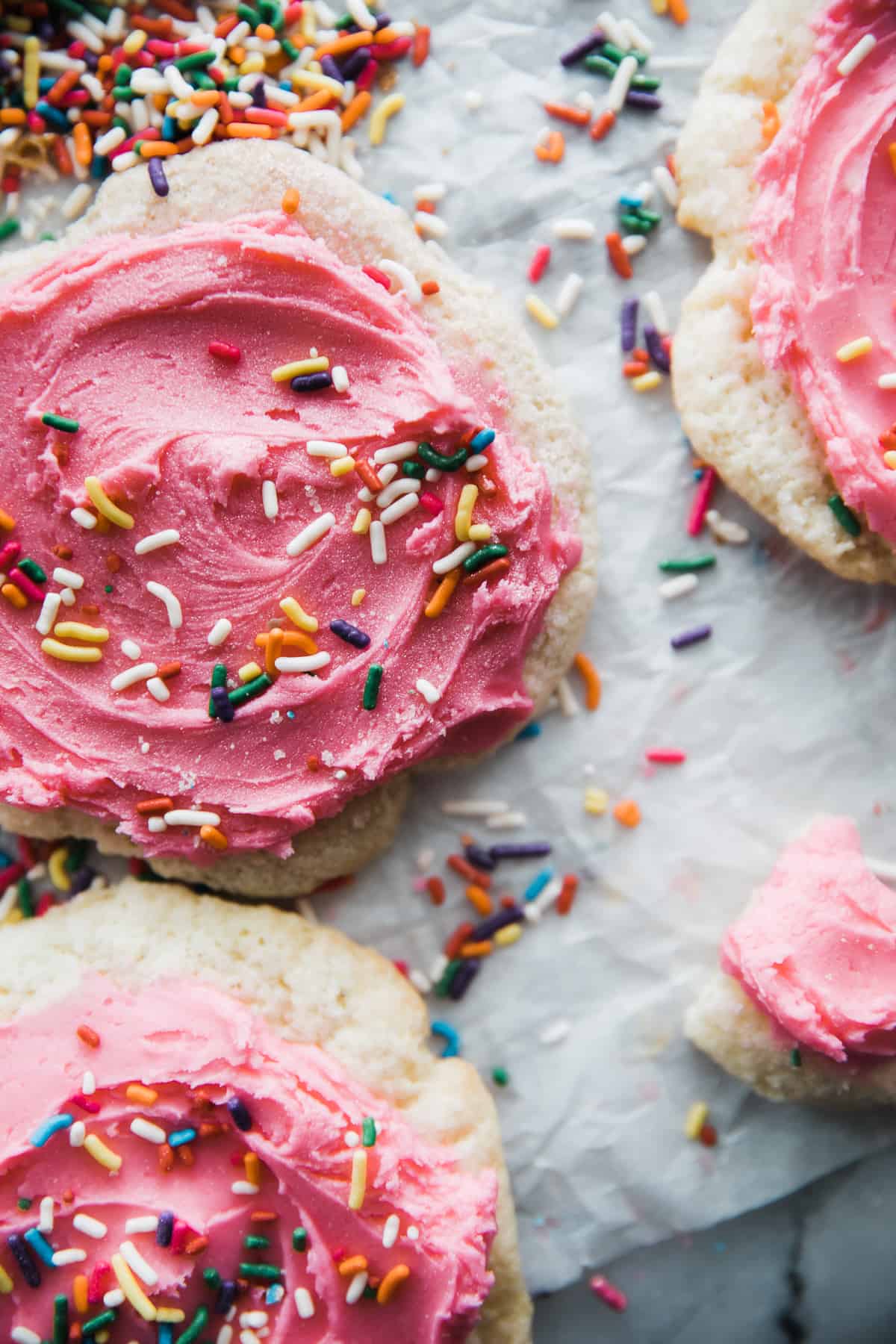Sour Cream cookies with pink frosting and sprinkles. 
