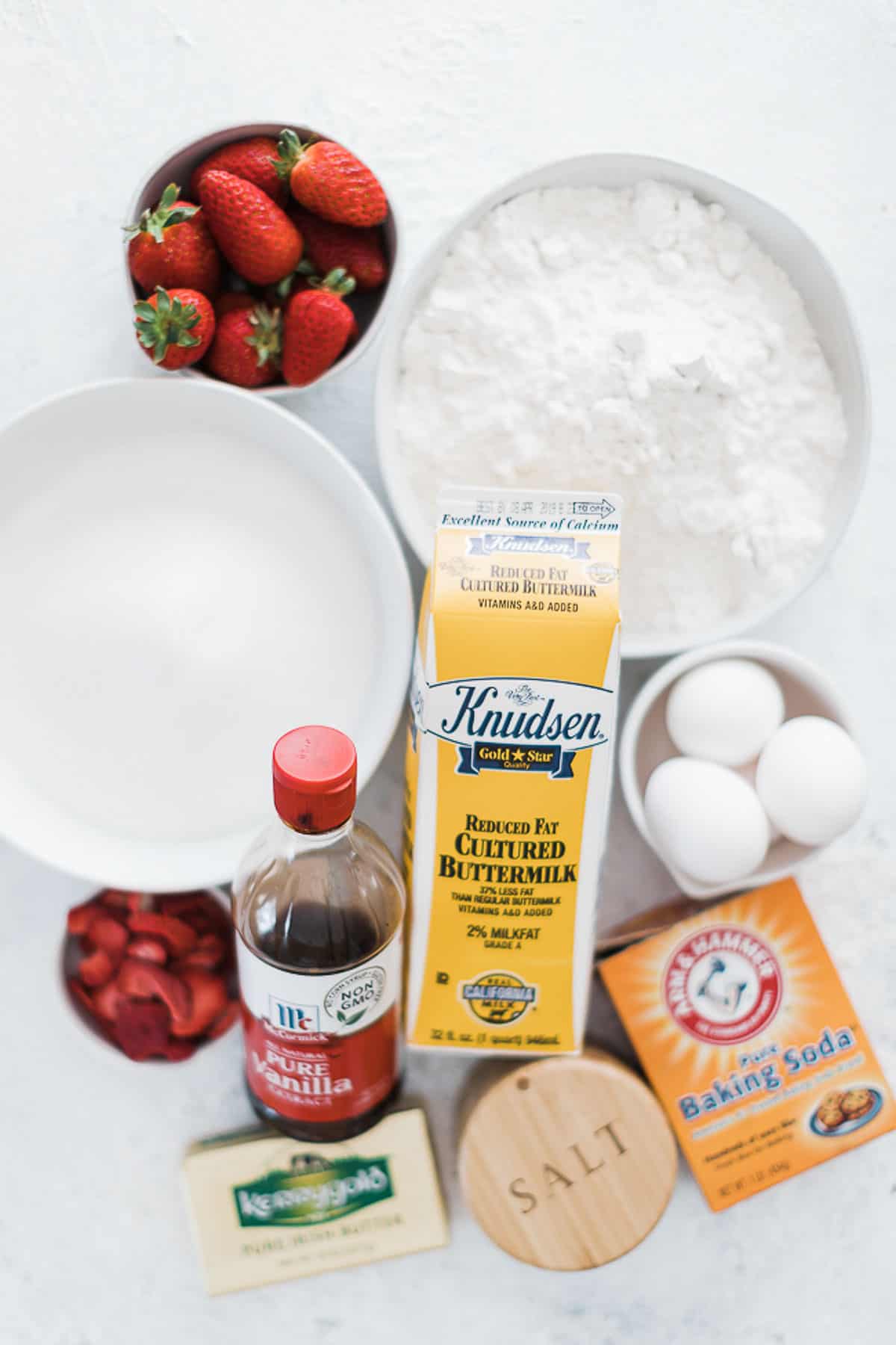 Ingredients needed to make homemade strawberry cake.