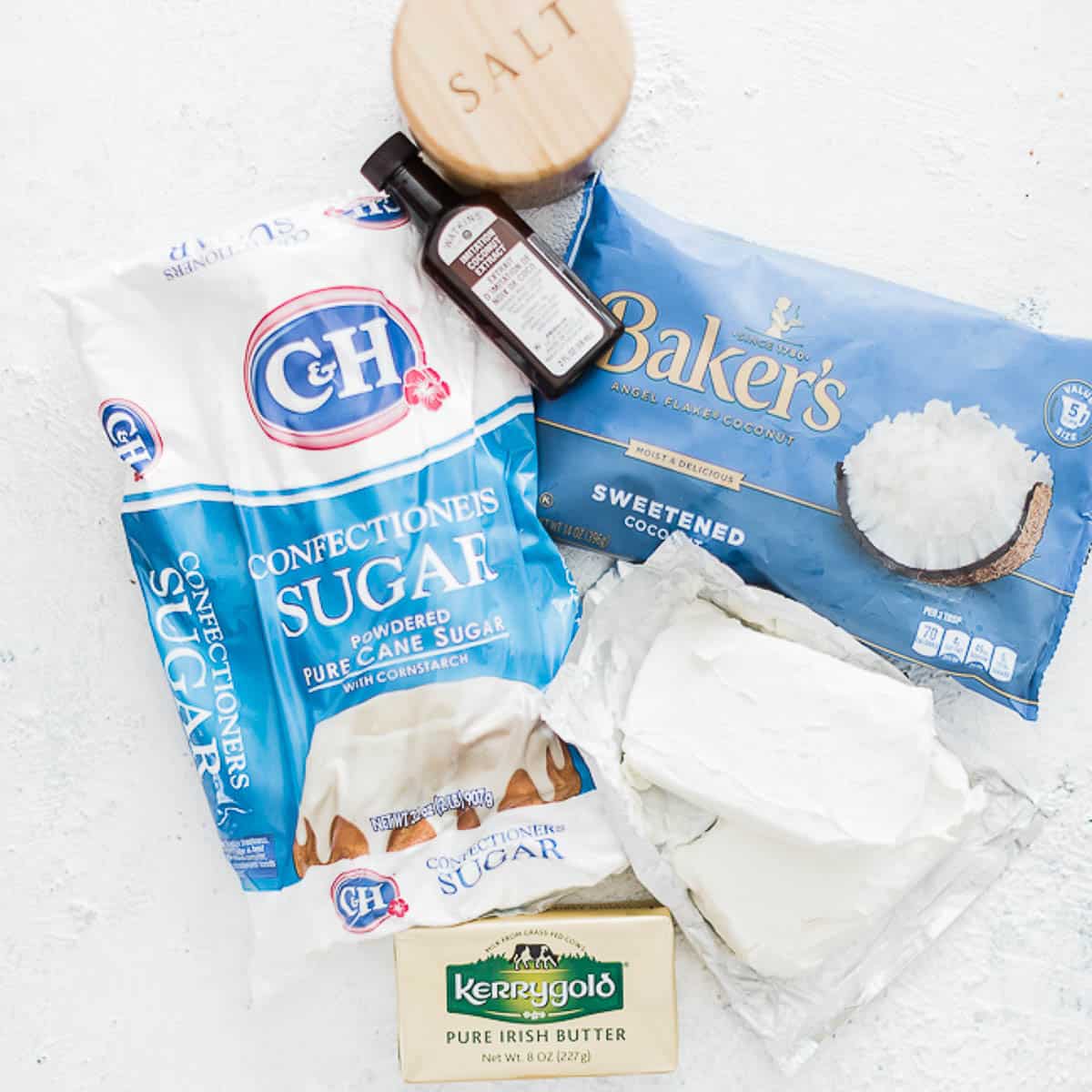 Ingredients needed to make coconut cream cheese frosting.
