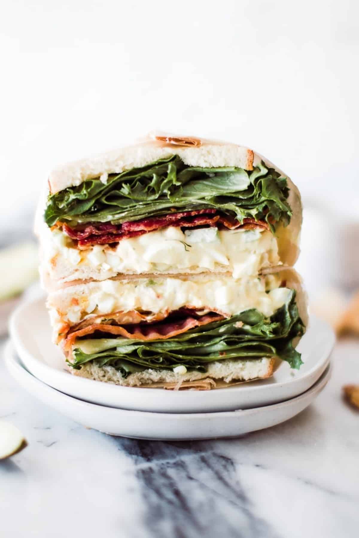 egg salad sandwich with lettuce and bacon