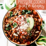 Pin for pinterest graphic with bowl of beans and text on top how to make pressure cooker pinto beans.