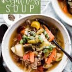 Pin for pinterest with bowl of weight loss soup and text on top. "world's best weight loss soup"