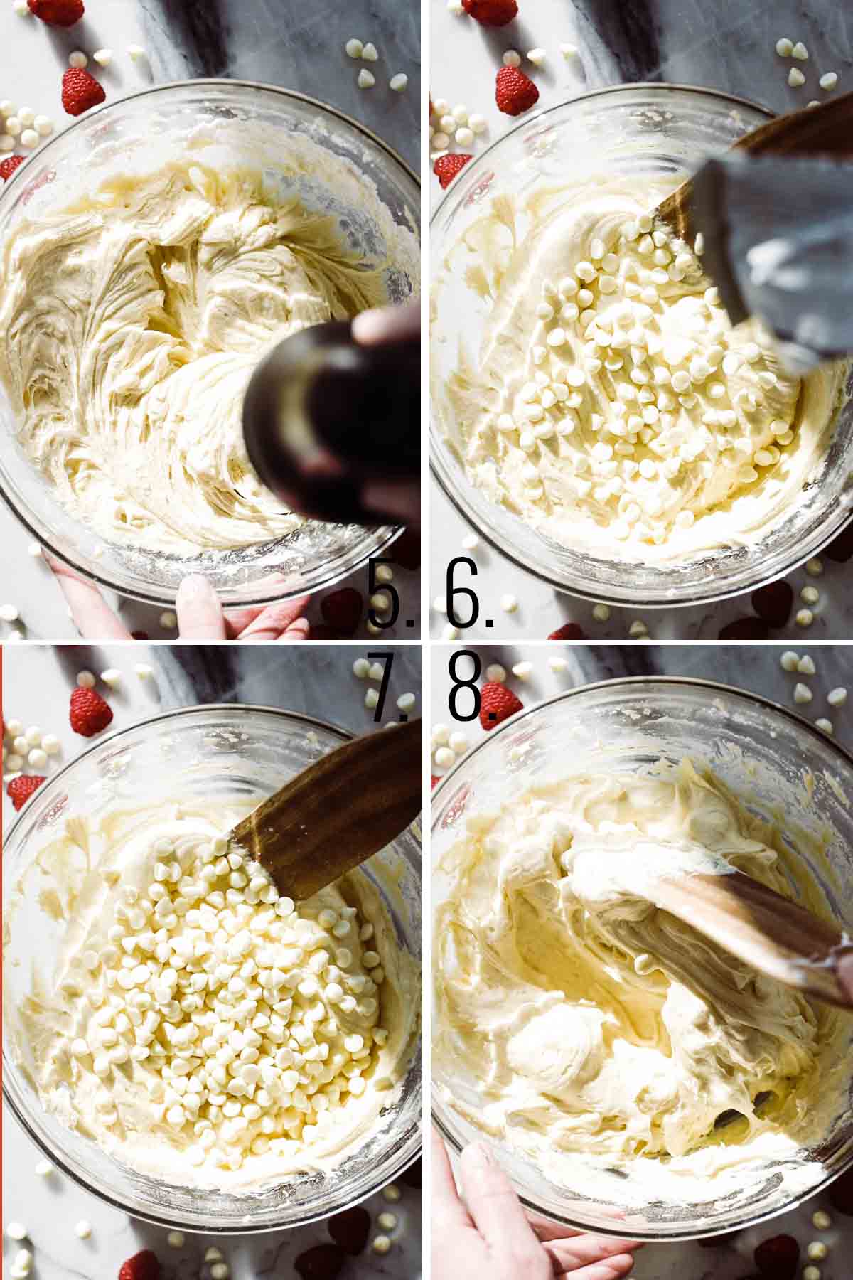 Large glass bowl mixing batter together and folding in white chocolate chips. 