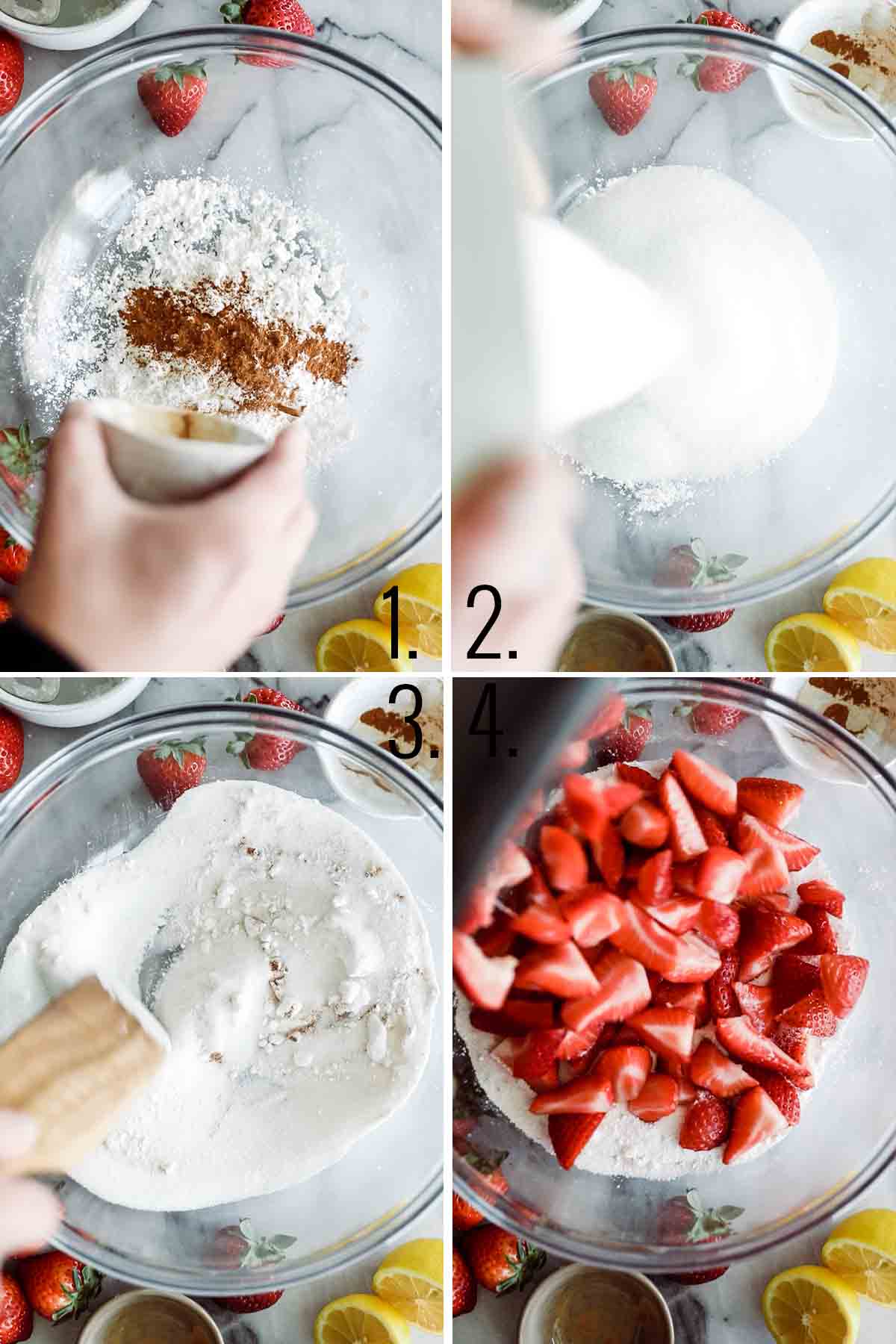 Dry ingredients and strawberries added to a glass bowl. 