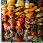 Colorful vegetable skewers served up on a platter.