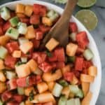 A bowl of melon salad with watermelon, cantaloupe, and honey dew in a bowl.