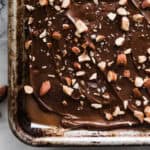 A pan of english toffee only showing one corner of the pan.