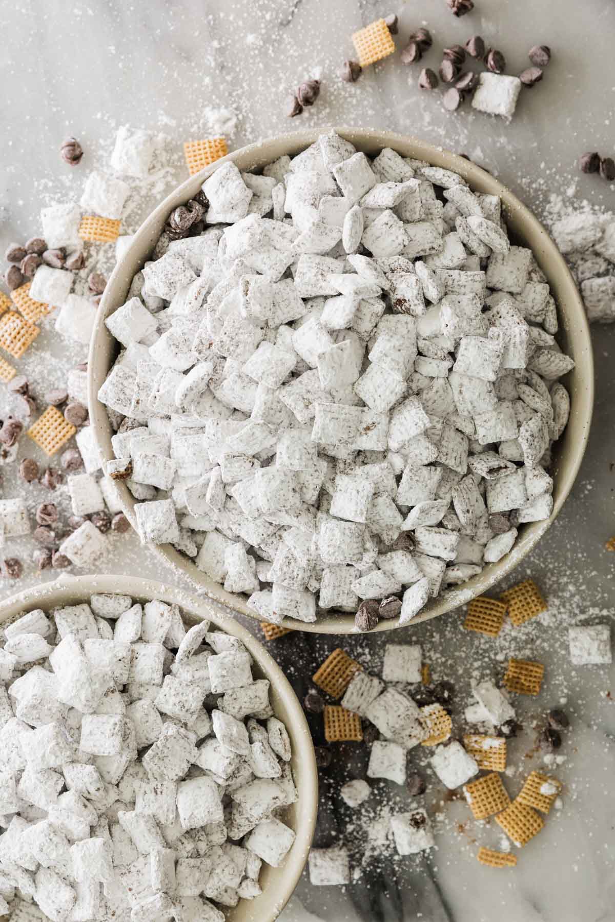 Chex muddy buddies with Nutella in bowls.
