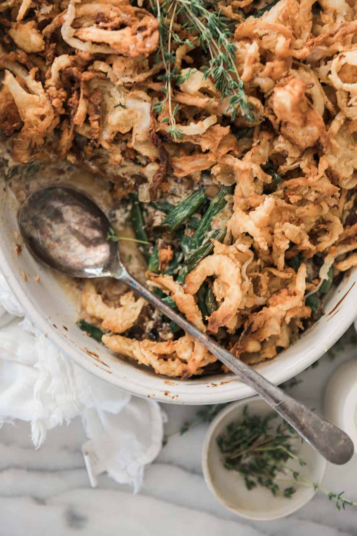 Fresh green bean casserole in a serving dish.