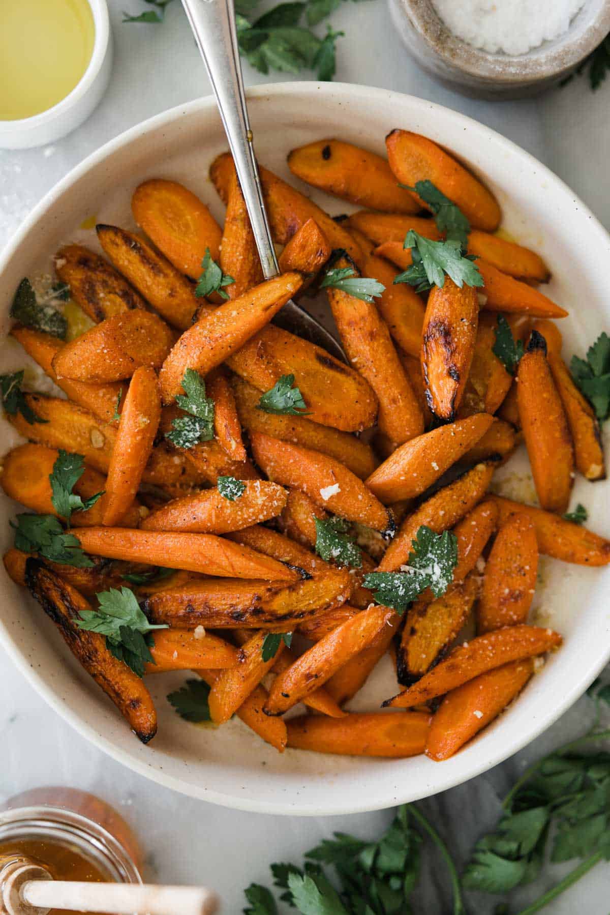Honey glazed carrots in a serving dish.